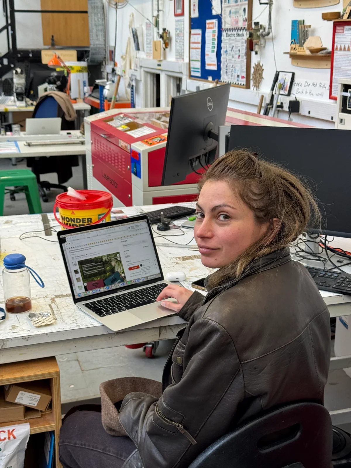 Original photo — Woman at Workshop Workstation